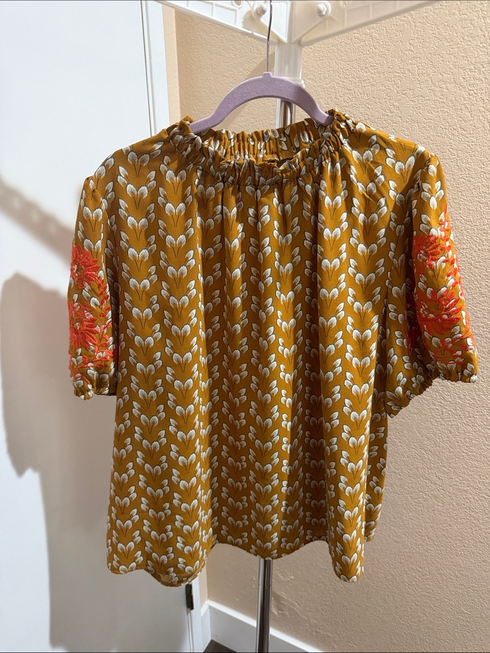 SHEIN Mustard Floral Smocked-Neck Blouse with Orange Embroidered Sleeves